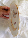 Assiette porcelaine dessert octogonale vintage décoration papillon 6 revisité par créatrice artistique dans atelier Français